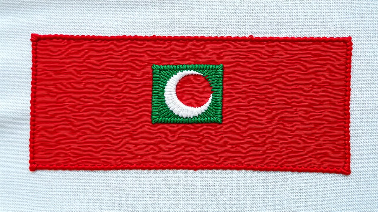 Flag of Maldives 🇲🇻 in embroidered textile style