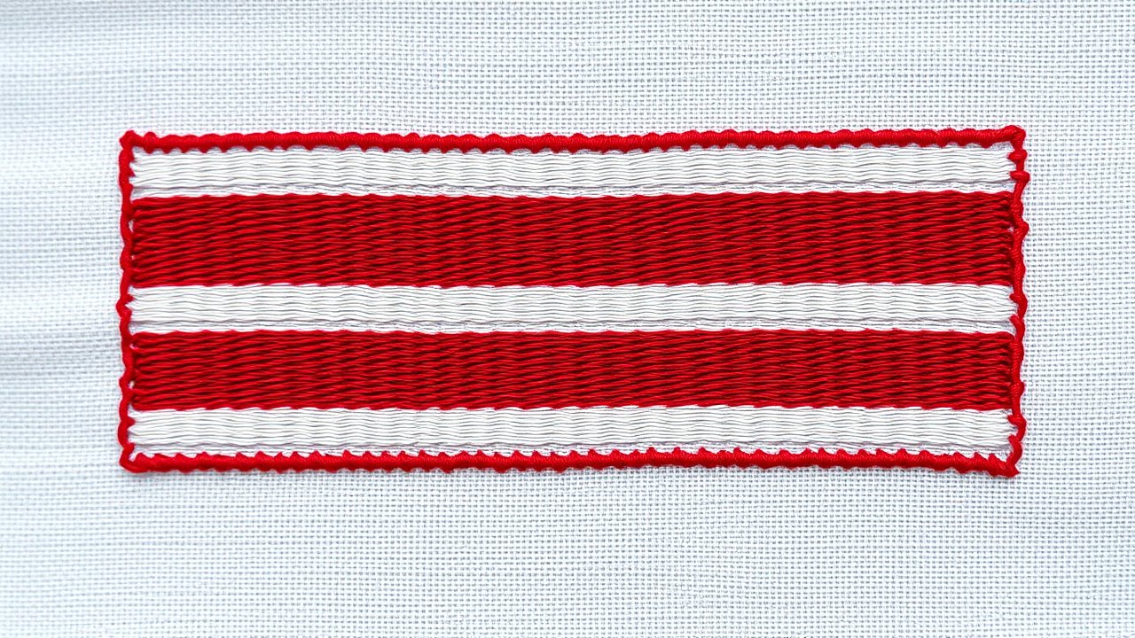Flag of Netherlands 🇳🇱 in embroidered textile style