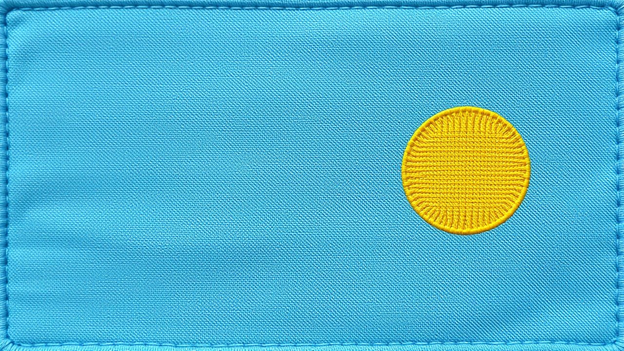 Flag of Palau 🇵🇼 in embroidered textile style