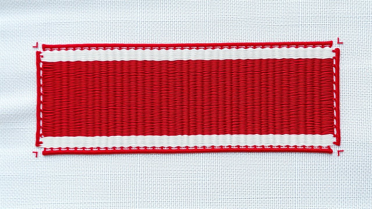 Flag of Poland 🇵🇱 in embroidered textile style
