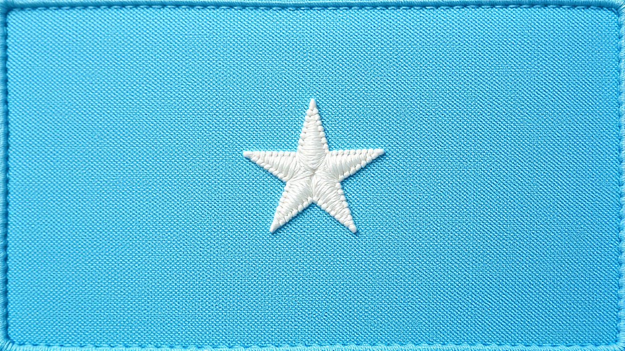 Flag of Somalia 🇸🇴 in embroidered textile style