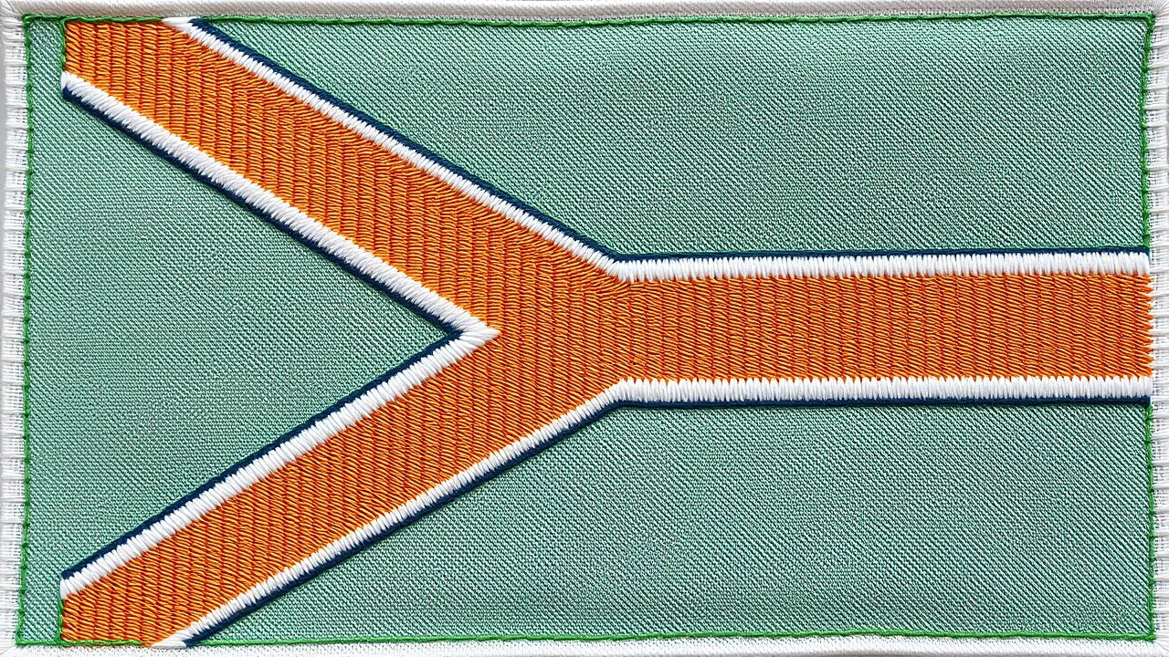 Flag of South Africa 🇿🇦 in embroidered textile style