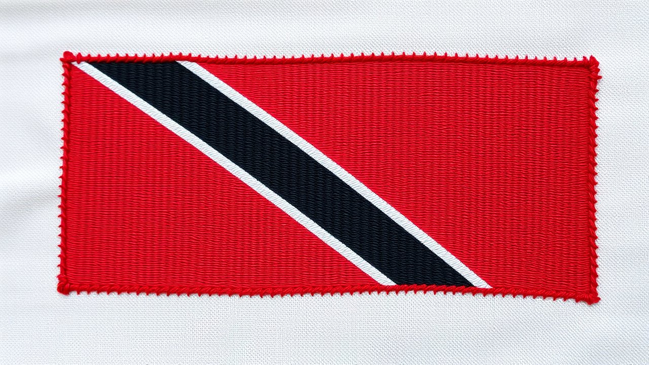 Flag of Trinidad and Tobago 🇹🇹 in embroidered textile style