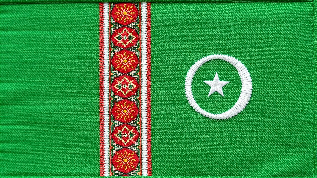 Flag of Turkmenistan 🇹🇲 in embroidered textile style