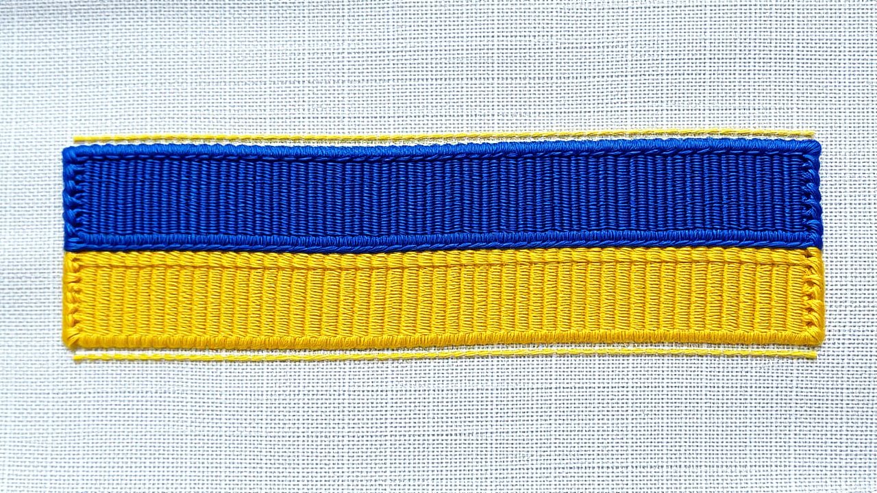 Flag of Ukraine 🇺🇦 in embroidered textile style