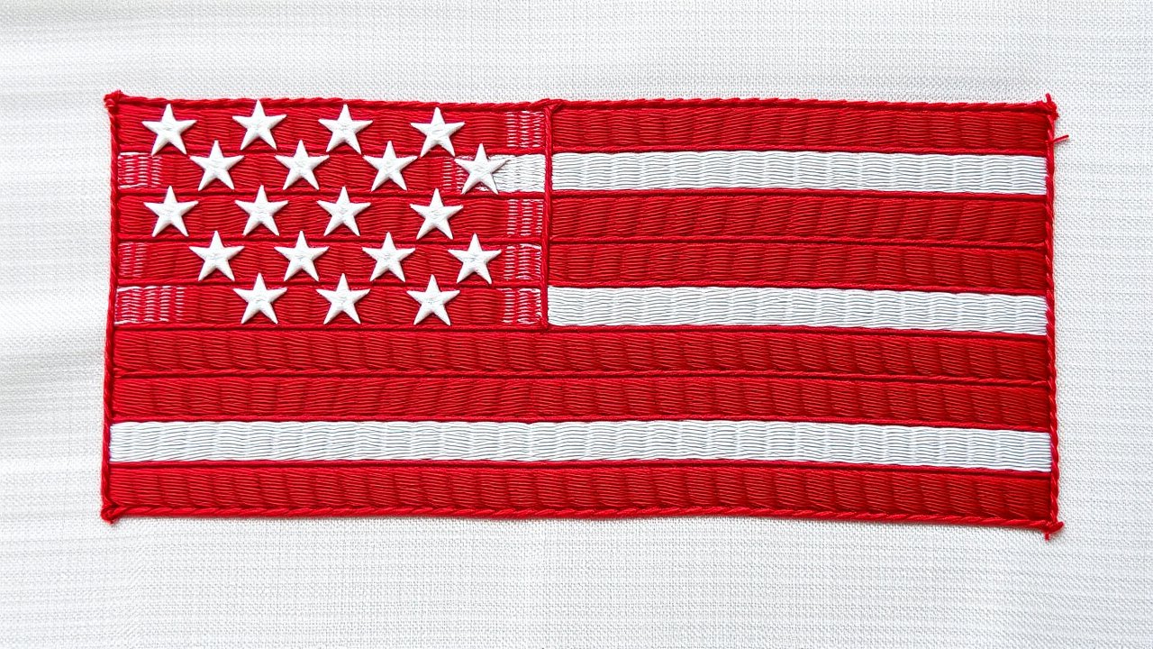 Flag of United States 🇺🇸 in embroidered textile style