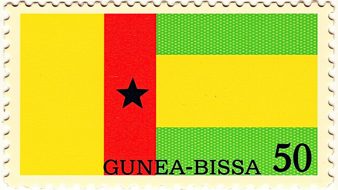 Flag of Guinea-Bissau 🇬🇼 in vintage postage stamp style